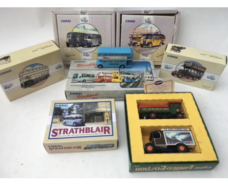 A box containing a collection of boxed Corgi Classics buses and coaches.