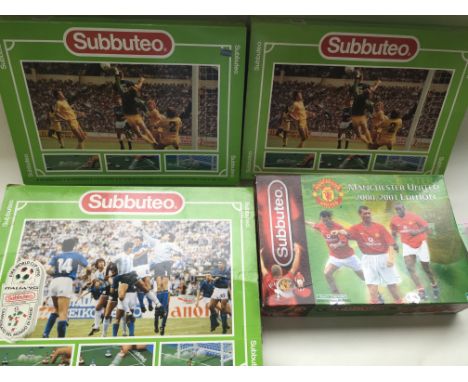 4 boxed Subbuteo football sets including Manchester United 2000-2001 edition .The two that are the same are complete, the oth