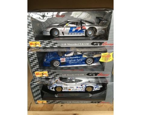 A collection of 5 mint boxed Maisto 1/18 scale GT racing cars.