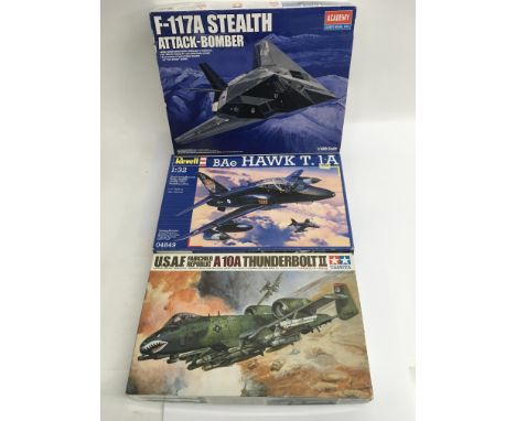 A collection of 11 boxed model aircraft (scales 1:48 & 1:32) including 'Hobby Boss', 'Revell', 'Trumpeter', 'Academy', 'Tamiy