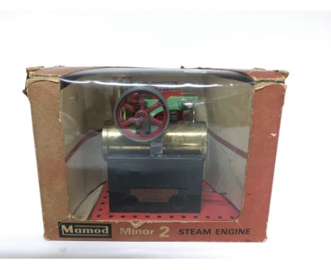 A miniature boxed Mamod Minor 2 steam engine