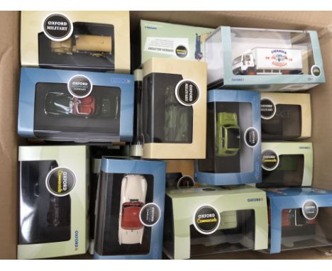 A large collection of mint boxed Oxford Diecast model vehicles including military, automobile company, commercials, collectab