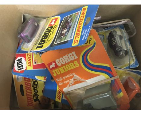 A collection of carded model vehicles including Corgi , Mattel, Matchbox, and Lone Star ( please note models have been remove