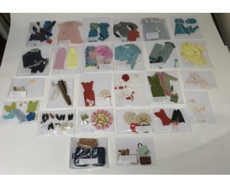 A collection of vintage 1960’s Barbie doll outfits and accessories, many with original labels including a ‘Poodle Parade’ out