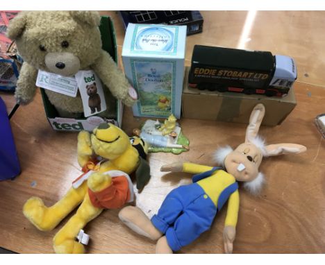 A boxed talking 'Ted' bear, a talking Dylan doll, a Hong Kong Phooey doll, a Winnie The Pooh boxed Royal Doulton figure and a