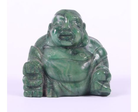 A Chinese carved jade seated Buddha, 1 7/8" high