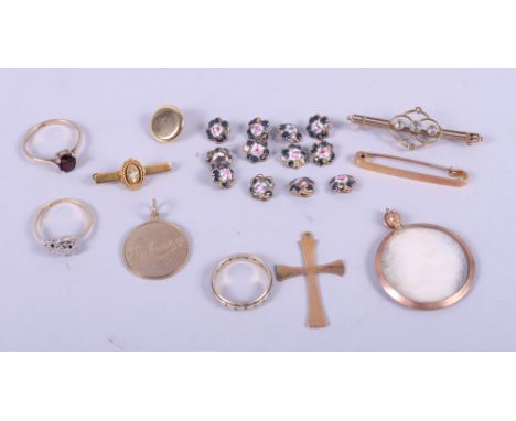 An 18ct gold crossover ring set three diamond brilliants, a 15ct gold bar brooch, set three stones and seed pearls (one missi