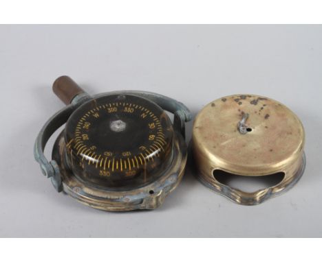 A ship's "Sestrel" brass cased gimballed oil compass, by Henry Browne &amp; Sons, with cover, 5" dia