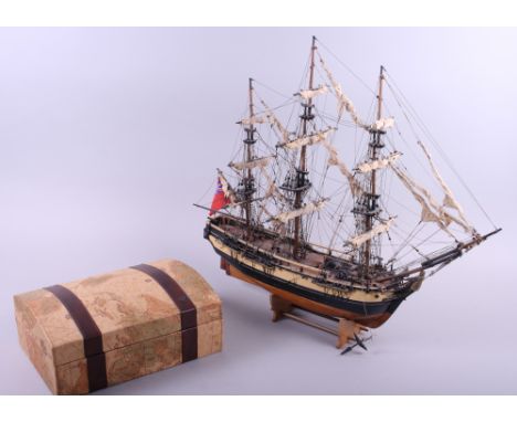 A model of a three-mast barque, 21" high, a boxed games' compendium of backgammon, chess, cribbage, dominoes and poker