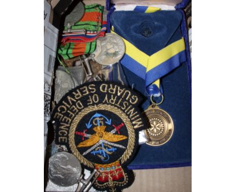 Four WWII General Service Medals, two WWII Defence Medals, two 1939-45 Stars, and MOD cloth badge, a Rotary Foundation medal,