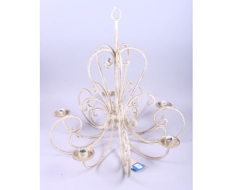 A cream painted wrought iron five-light chandelier