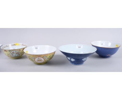 Two Chinese porcelain bowls with yellow grounds and two Chinese porcelain bowls with blue groundsCondition: Yellow bowl with 