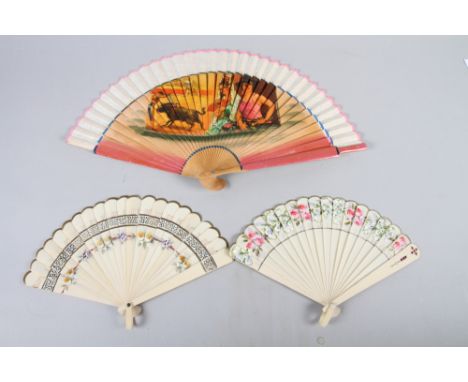 Two early 20th century Celluloid brise fans, one with painted vane, the other set "gems", and a Spanish fan