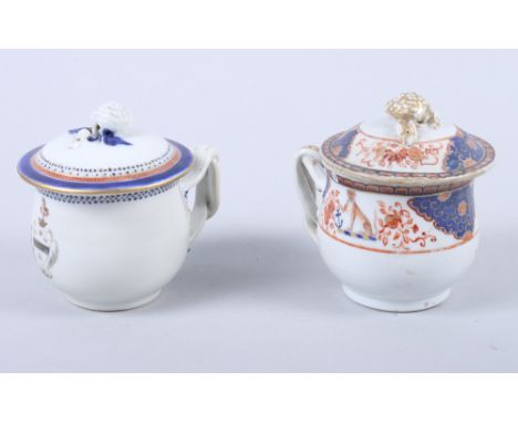 Two 18th century Chinese armorial chocolate cups and covers Condition report:The blue, red and gilt cup has some wear to the 