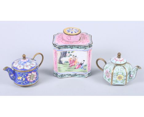 A Chinese enamel on copper tea caddy and cover, 4" high (damages) and two similar miniature teapotsCondition: Tea caddy: loss