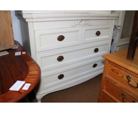A Laura Ashley chalk-white painted chest of two short and two long drawers, on bracket feet, 47 1/2" wide x 38" high