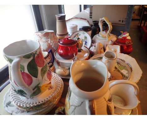 Shelf of mixed ceramics including Worcester and Le Creuset  