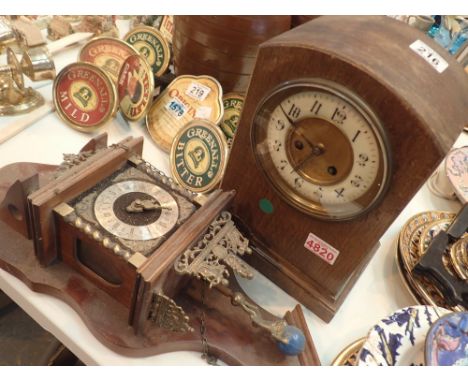 Brass and mahogany atlas clock lacking weights and Edwardian oak veneered mantel clock 