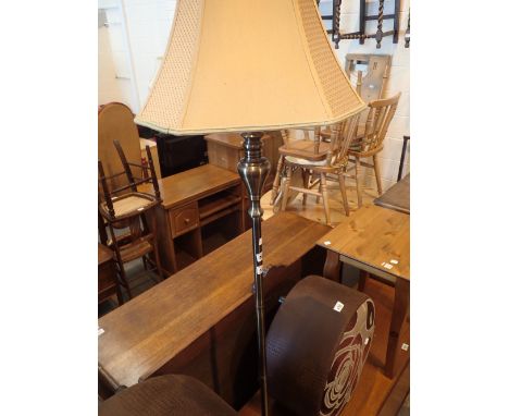 Spun metal standard lamp with green and gold shade
