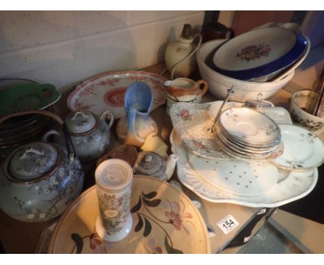 Shelf of mixed ceramics 