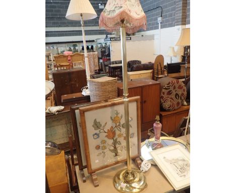 Two embroidered fire screens and a brass standard lamp