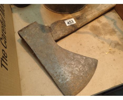 Large axe with wooden handle