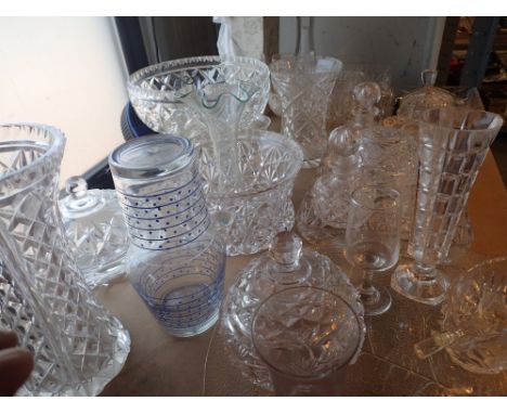 Shelf of crystal and cut glass items including dressing table set bowls glasses decanter etc