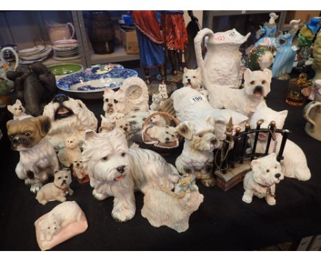 Large collection of ceramic and cast resin dogs