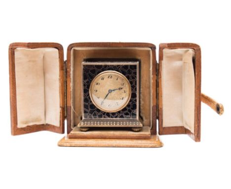 Zenith, an Edwardian brass and enamel boudoir clock: the eight-day duration movement with lever escapement, the gilded dial h