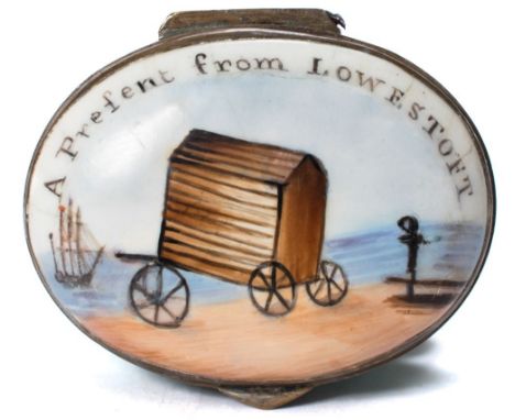 An English enamel patch box inscribed 'A Present from Lowestoft': of oval form with interior mirror, the lid painted with a b
