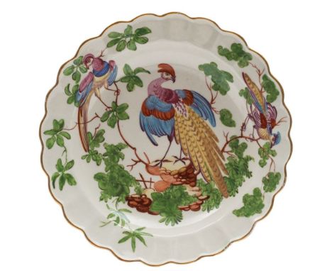 A First Period Worcester dessert plate: with scalloped rim, decorated in the workshops of James Giles with three brightly col