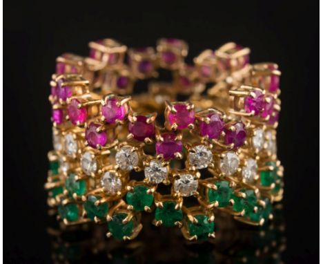 A set of three emerald, ruby and diamond eternity rings: each set with circular stones in a 'zig zag' pattern, ring size 'O/P