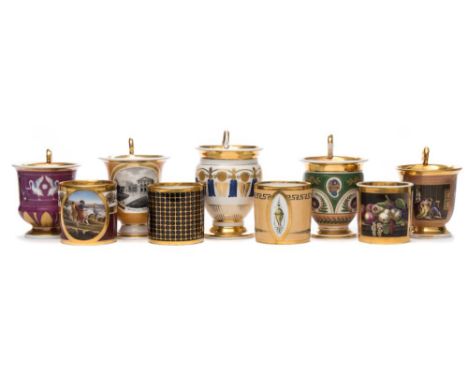 A group of four early 19th century Paris porcelain coffee cans and five cups: the cups in Empire style with scroll handles, o