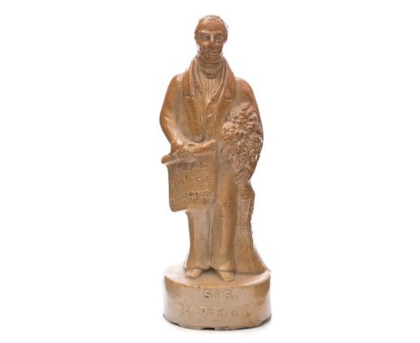 A salt glazed stoneware spirit flask in the form of Sir Robert Peel: modelled standing with his arm around a stand of corn an