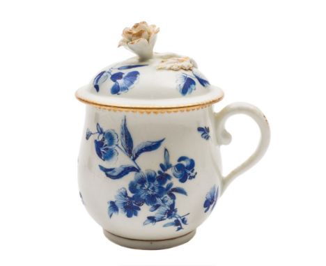 A First Period Worcester custard cup and cover: of bell shape with domed cover and flower finial, painted in 'dry' blue with 