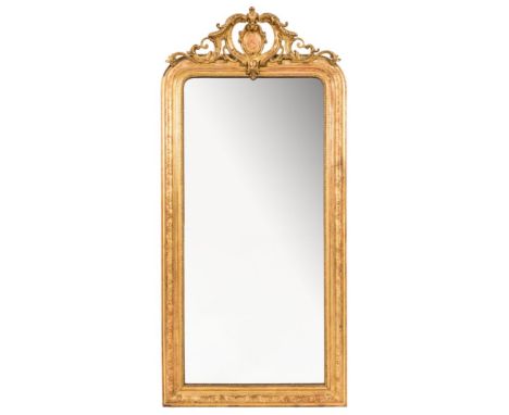 A Victorian giltwood and gesso pier mirror:, with pierced acanthus leaf scroll cresting centred by a cartouche in scroll surr