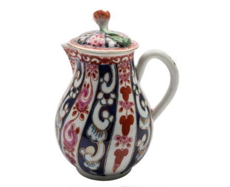 A First Period Worcester sparrow beak milk jug and cover: of baluster form with loop handle, painted with the 'Queen Charlott