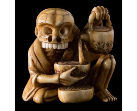 A 20th century Japanese carved ivory netsuke: of a skeleton pouring tea from a teapot into a bowl, unsigned, , 4cm. high.