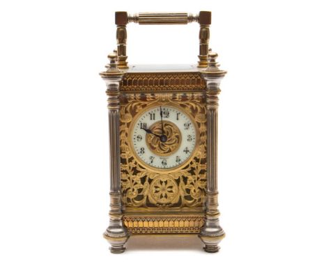 A French Edwardian carriage clock: the eight-day duration timepiece movement having a platform cylinder escapement, the brass
