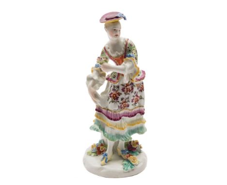 A Derby figure of a dancing lady: holding a posy in her left hand and the folds of her skirt in the other, her costume painte