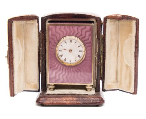 An Edwardian enamel and silver-gilt boudoir clock: the eight-day duration timepiece movement having a platform lever escapeme