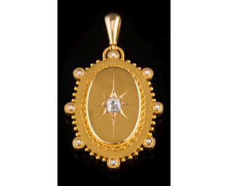 A Victorian gold, diamond and seed pearl mounted oval pendant locket: star-set with central cushion shaped, old-cut diamond e