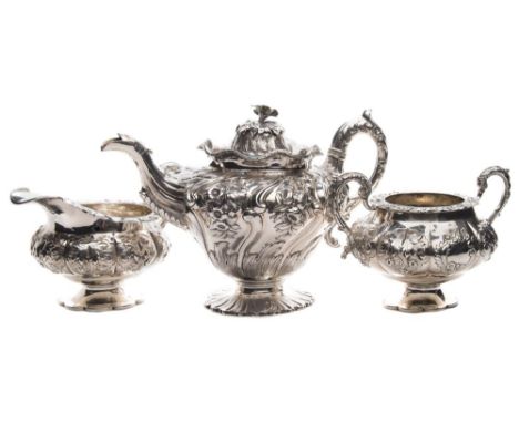 A matched early 19th century silver three-piece tea service: the teapot with maker's marks for J B Cameron and Leonard Urquha