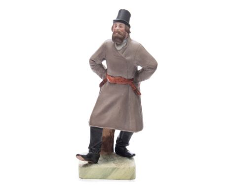 A Gardner (Moscow) biscuit porcelain figure: of a dancing bearded peasant, standing with  hands on hips and wearing a tall ha