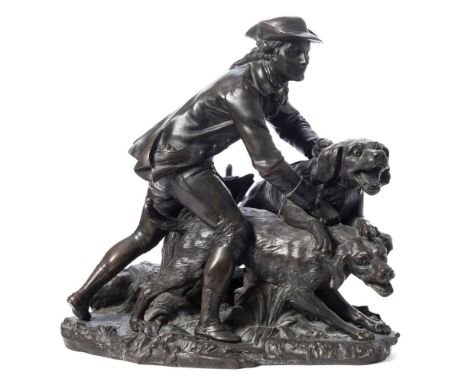 Huntsman and hounds, a bronze study: dark brown patination, the huntsman in 18th century attire holding back two hounds, on a