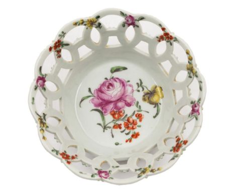 A First Period Worcester small basket: the sides in the form of interlocking pierced circles, painted with a spray of a large