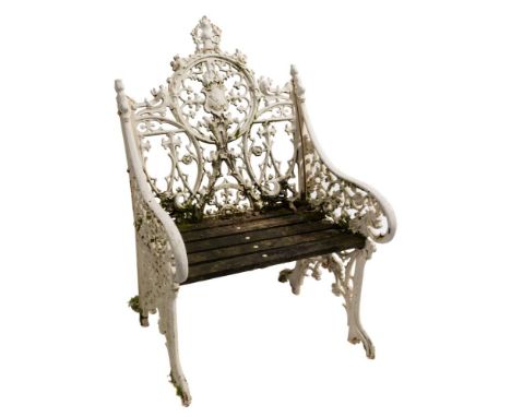 A Victorian cast iron garden armchair:, of Coalbrookdale type, the back pierced and decorated with stylised foliage and Gothi