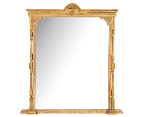 A Victorian giltwood and gesso overmantel mirror:, the egg and dart cornice with domed arch centre with floral foliate garlan