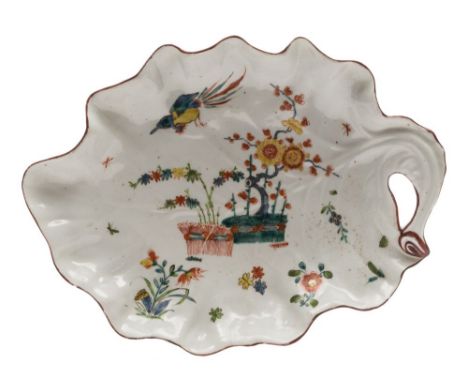 A First Period Worcester leaf-shaped dish: the cabbage leaf with pierced stalk handle, painted in the Kakiemon style with the