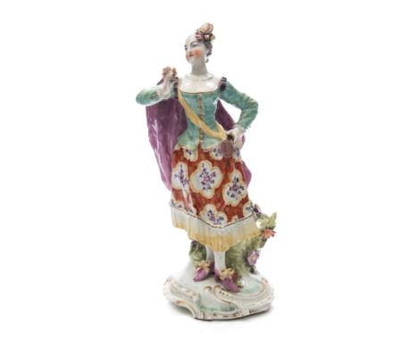 A Derby porcelain figure of a 'Ranelagh Dancer': the lady holding a posy in her right hand and wearing a green bodice, floral